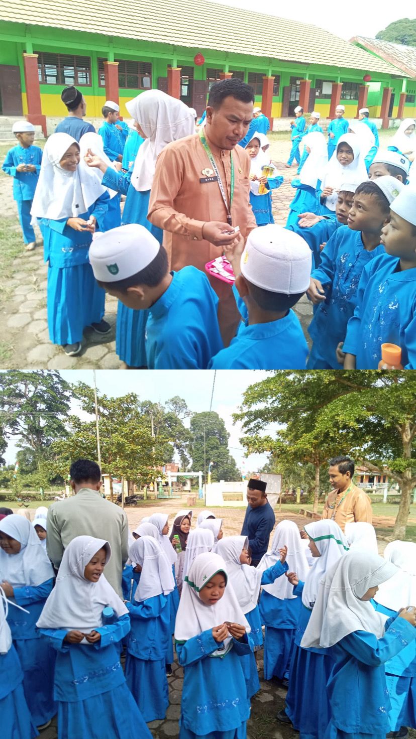 PEMEBERIAN OBAT CACING DARI PETUGAS KESEHATAN DI MIN 2 BATANG HARI